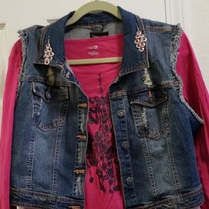 Distressed denim vest